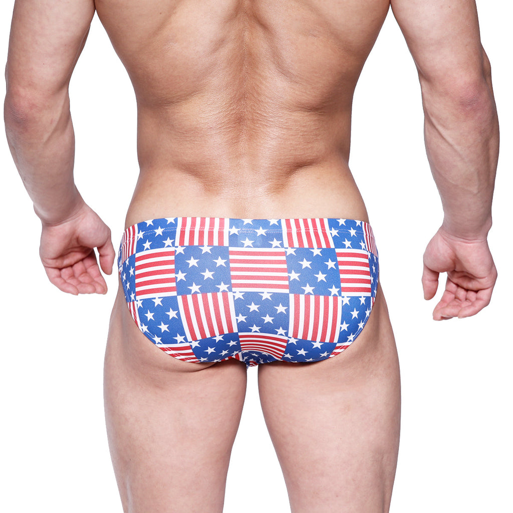 MetroMalewear cannon hip brief usa blue swim trunks with red white and blue american flag patchwork design