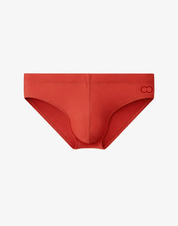 2EROS V10 Core Bikini Swimwear in rust orange, featuring a low-rise style and subtle logo on the hip.