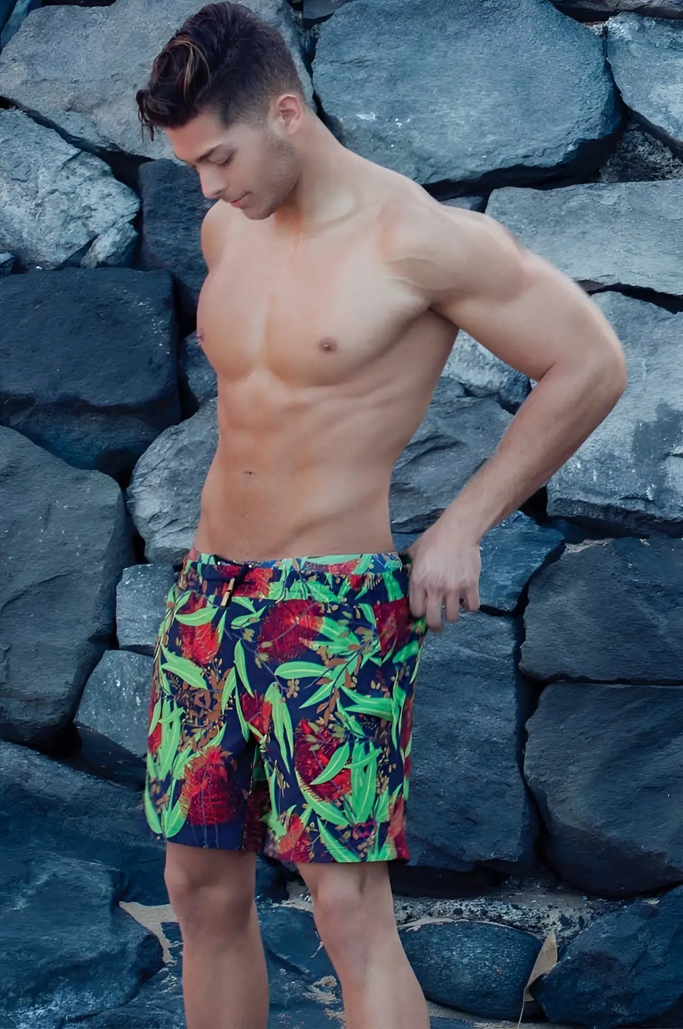 Vibrant tropical-print 2eros australiana shorts swimwear with bold red green and navy blue foliage patterns in size xl