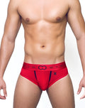 Red men’s briefs with black trim and 2EROS logo on waistband from the X Series passion U2151PA size L
