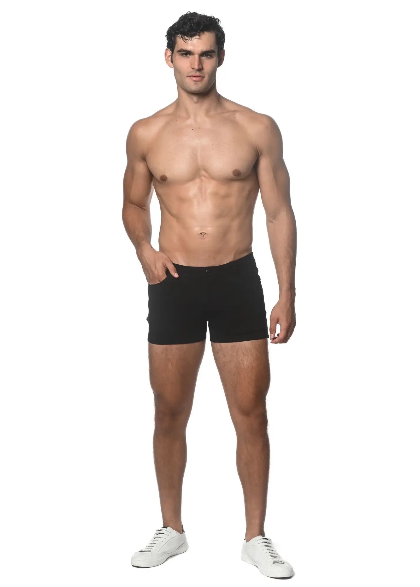 Black 3 inch stretch knit athletic shorts made of stretchy fabric worn by a model for active use