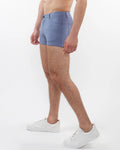 Blue denim 3 inch stretch knit shorts with classic five-pocket design and button closure