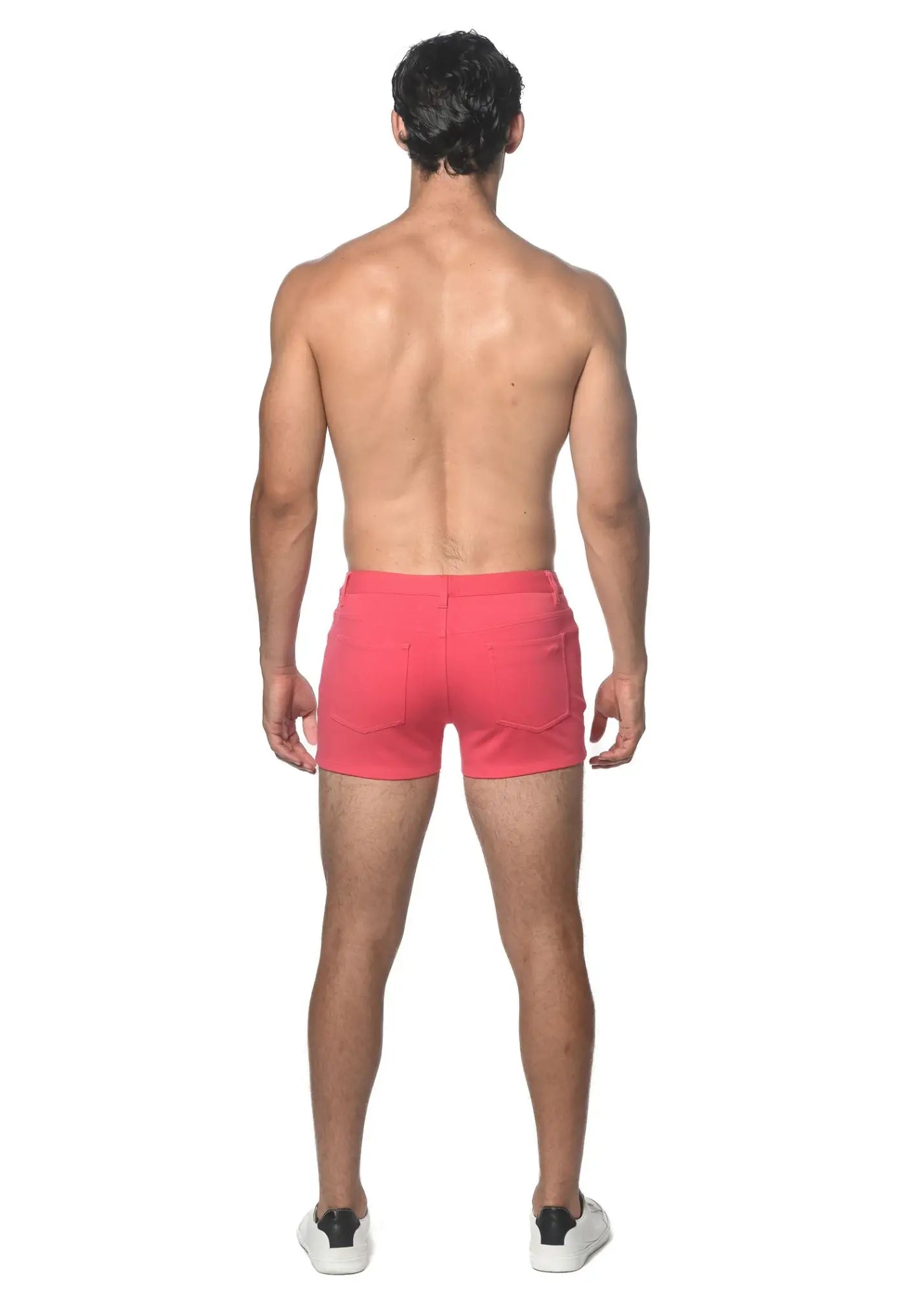 Bright pink 3 inch stretch knit athletic shorts with a modern design and subtle side pockets