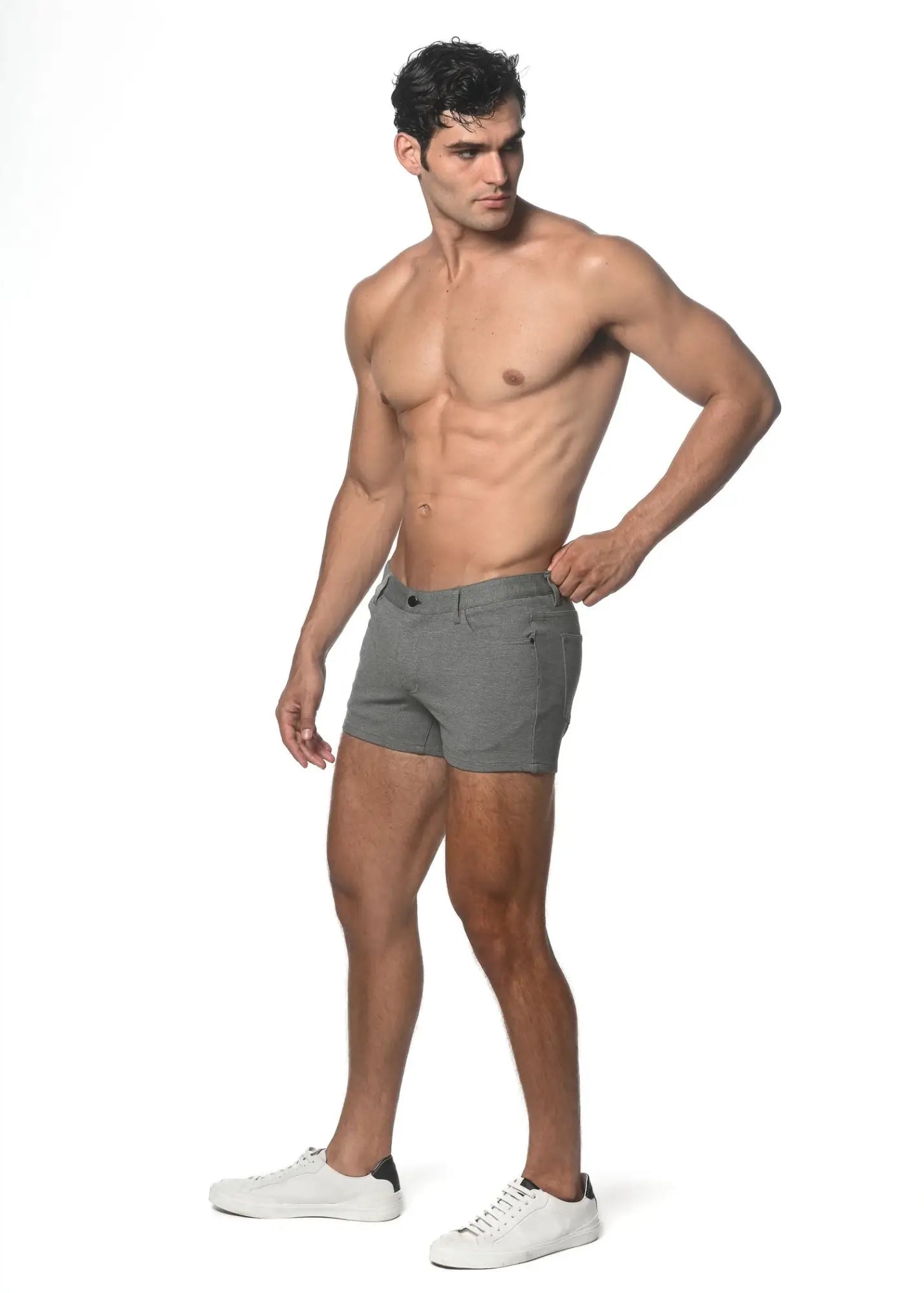 Gray 3 inch stretch knit shorts for men with classic five pocket design and subtle stitching details