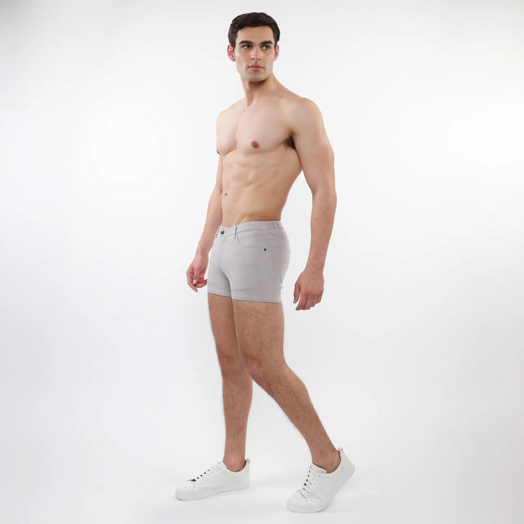 Light gray 3 inch stretch knit slim-fit men’s shorts with classic five-pocket design and subtle stitching details
