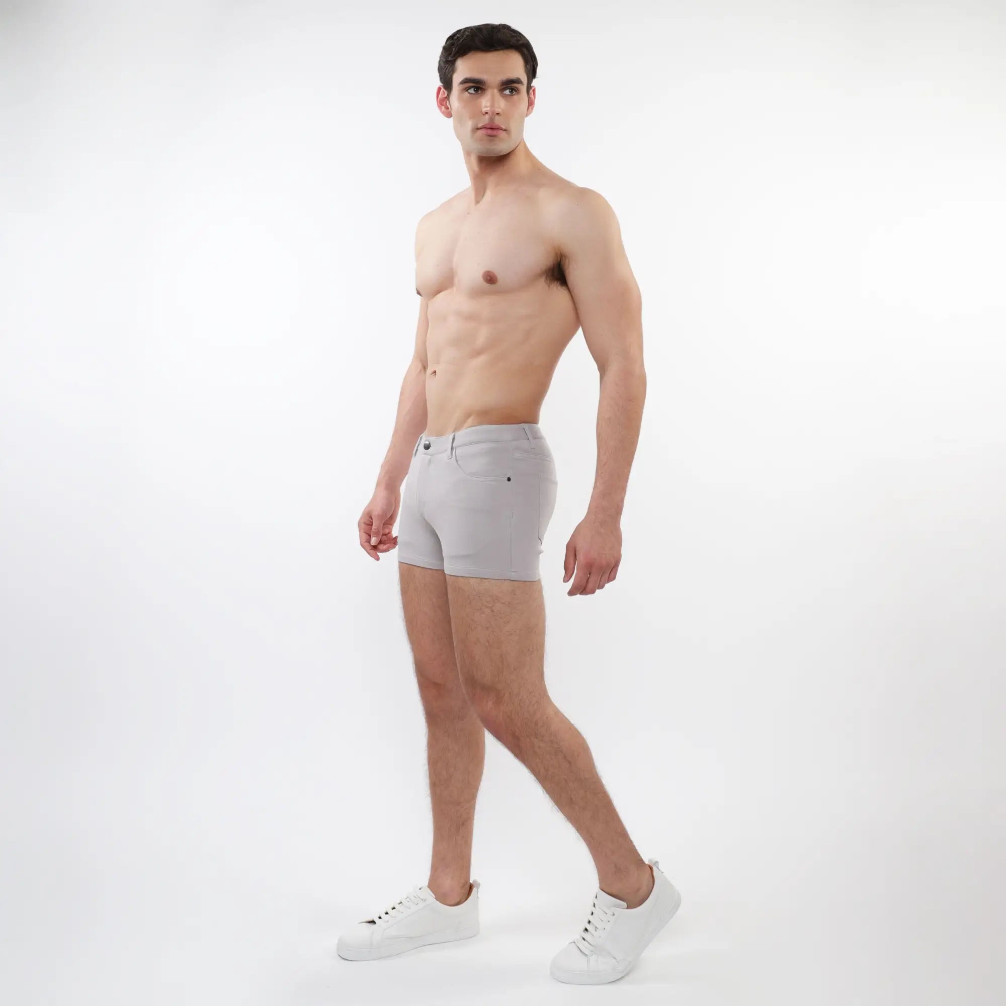 Light gray 3 inch stretch knit slim-fit men’s shorts with classic five-pocket design and subtle stitching details