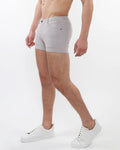 Light gray slim-fit 3 inch stretch knit shorts for men with classic five-pocket design and subtle stitching details