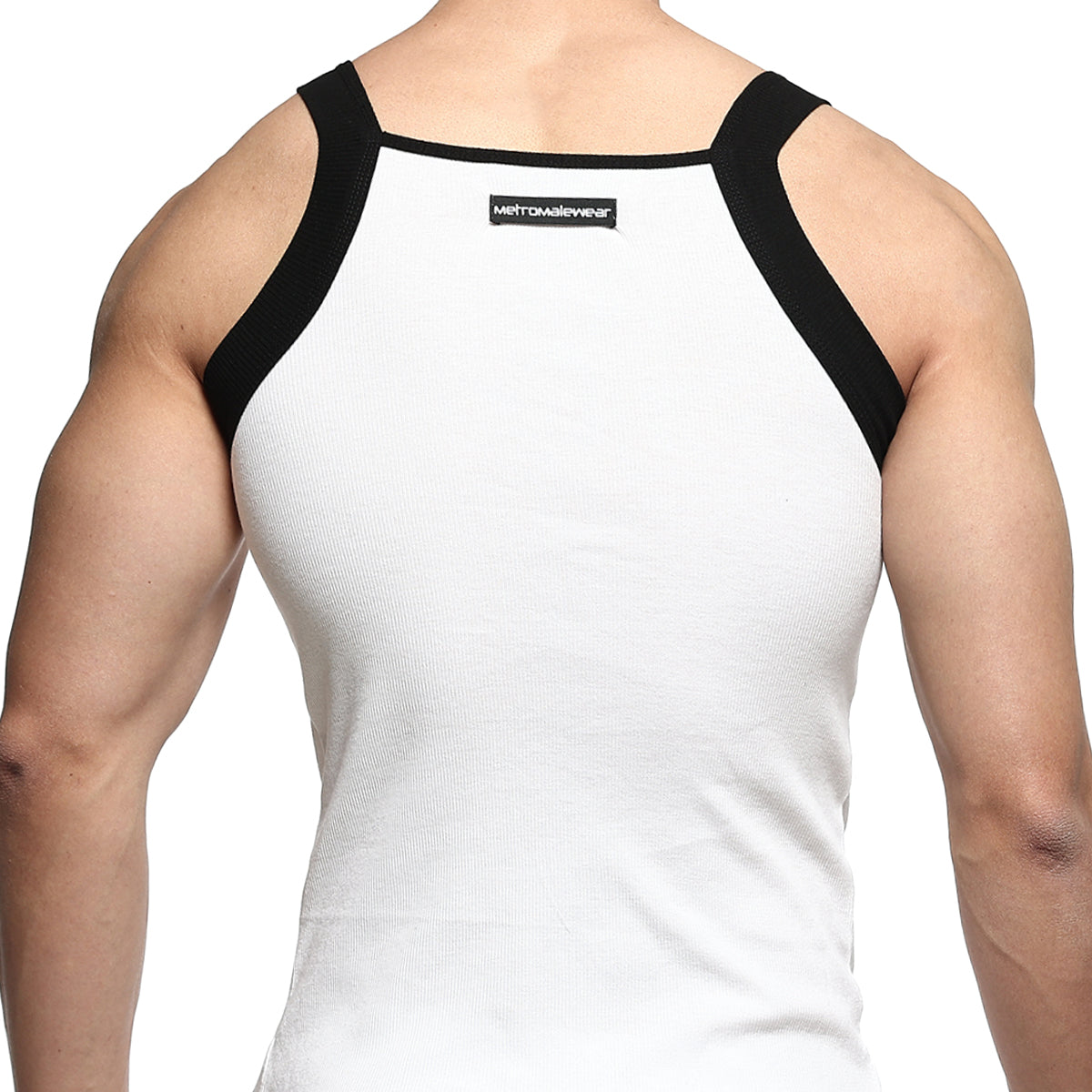 White ribbed square cut tank top with black shoulder straps and metromalewear label at the back