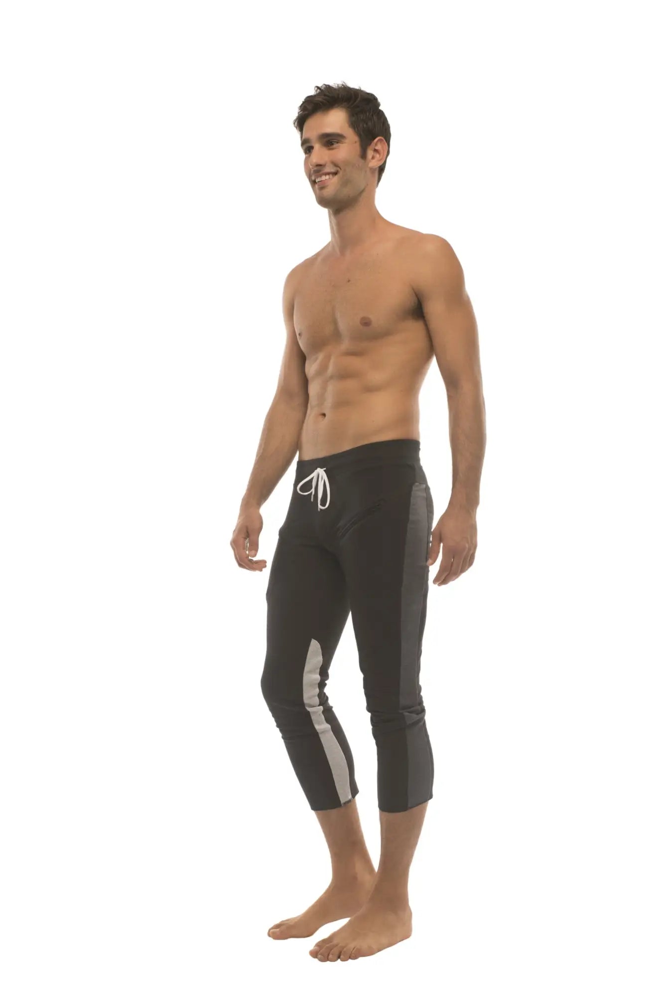 Mens 4/5 zipper pocket capri yoga pants in black with charcoal gray side stripes and white drawstring for comfort