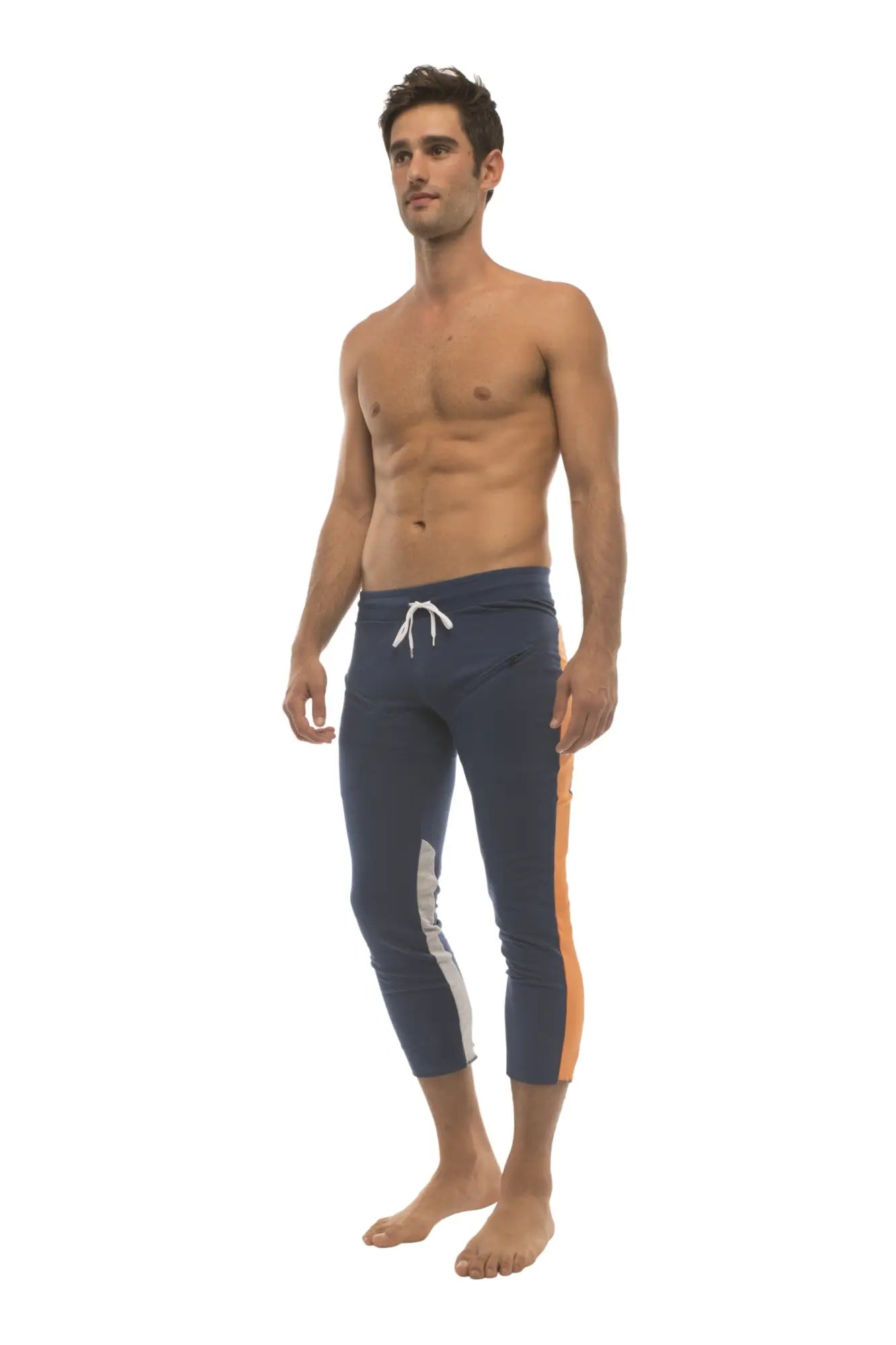 Mens navy blue swim trunks with white and orange side stripes and white drawstring waistband for active wear
