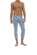 Mens light blue capri yoga pants with form-fitting fit white drawstring waistband and side zipper pockets