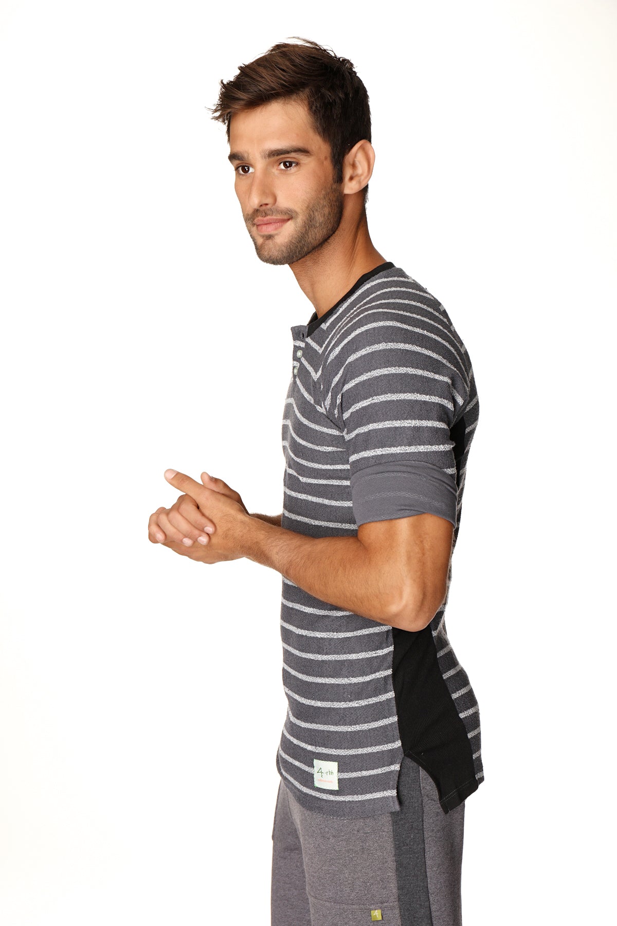 Gray and white striped short-sleeved henley tee with black side panels in french terry loop charcoal fabric