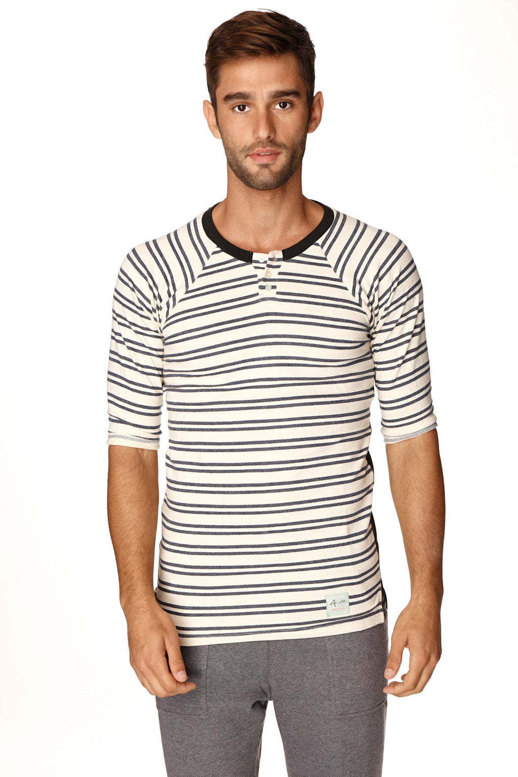 A men’s short-sleeved striped henley shirt in white and black with ribbed collar and three-button placket in french terry loop