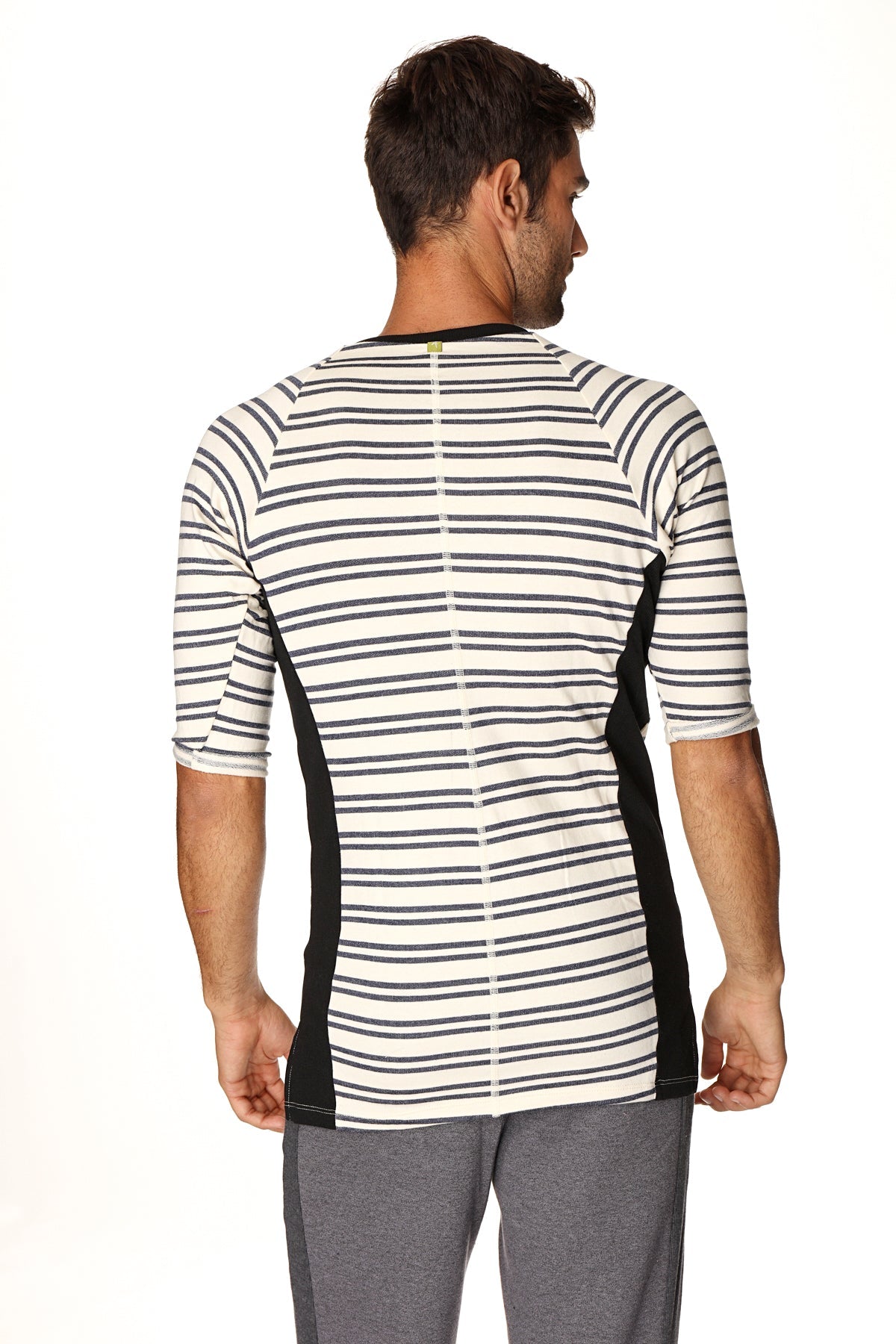 A men’s three-quarter sleeve vintage-stripe henley tee in navy double stripe french terry loop with black side panels