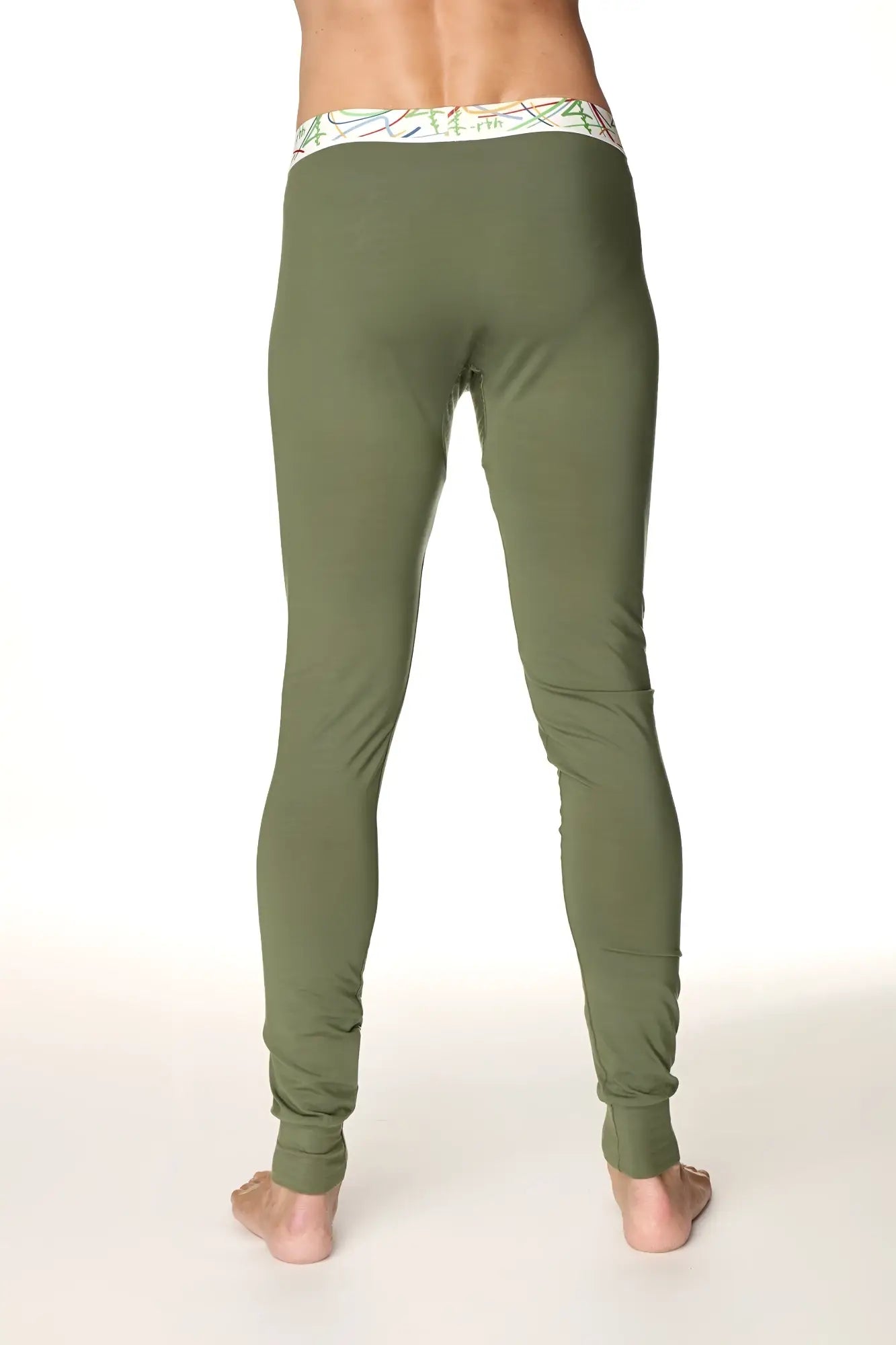 Olive green stretchy thermal yoga leggings with patterned white waistband designed for cross training and comfort
