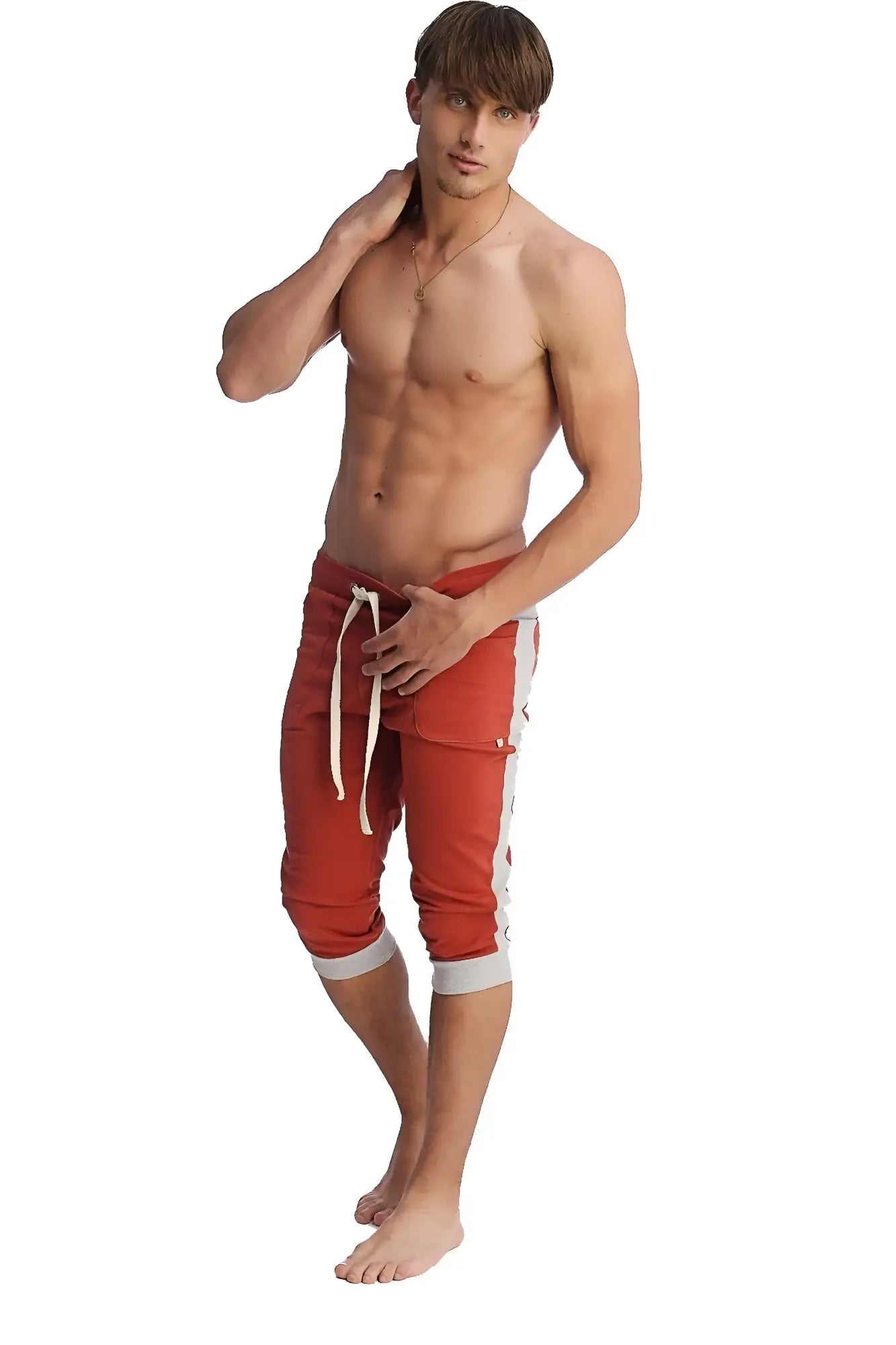 Red athletic shorts with white side stripes and matching drawstring designed for active wear and comfort