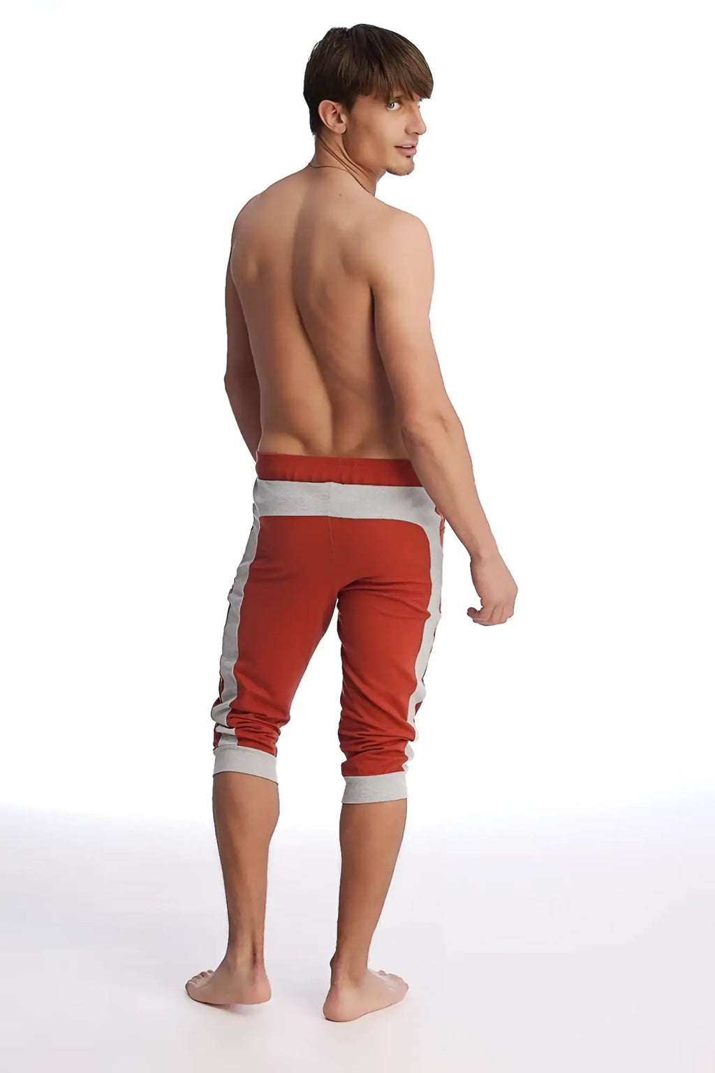 Red and gray cuffed yoga pants with ribbed cuffs designed for athletic wear and comfortable movement