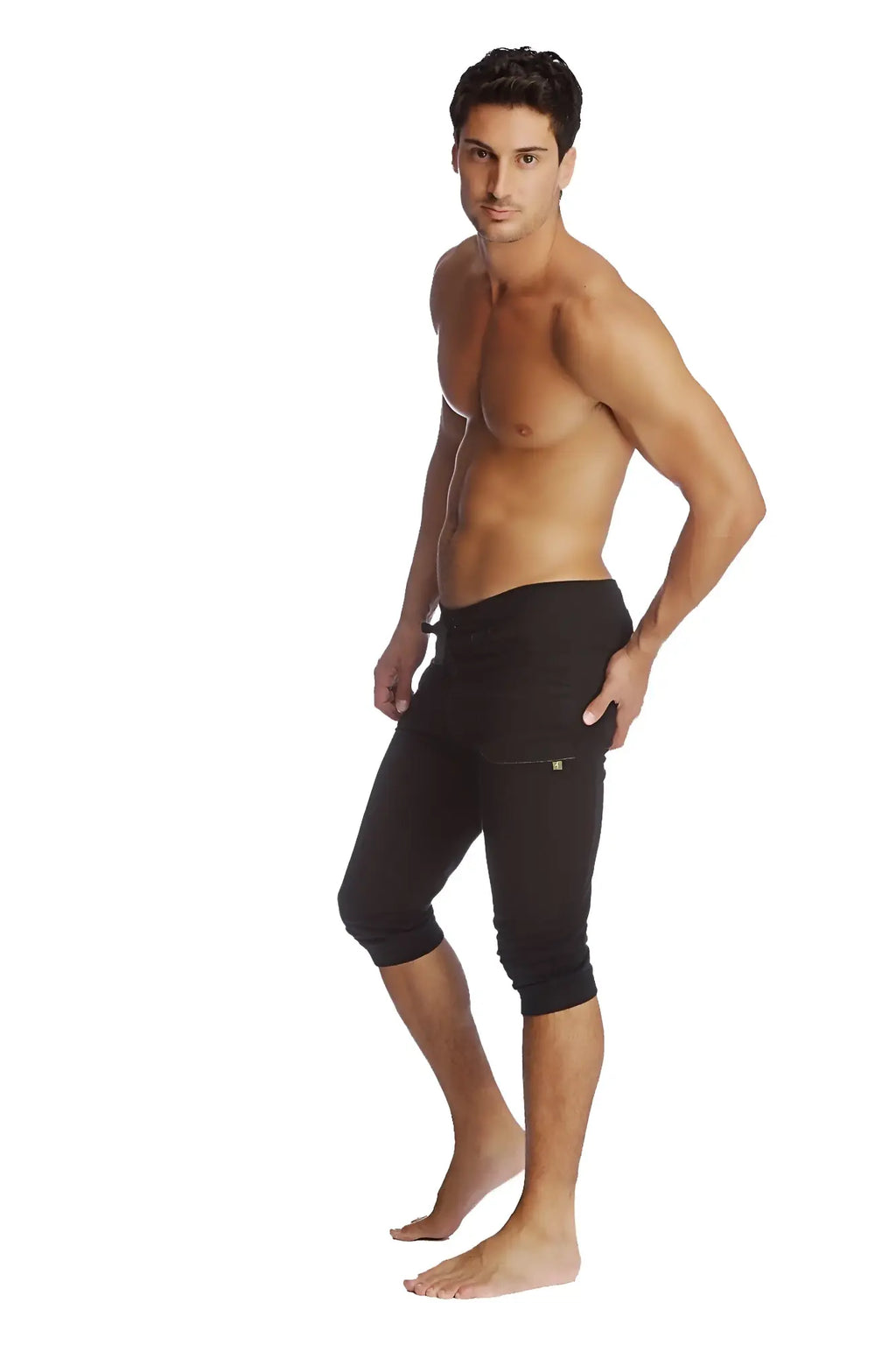 Black cuffed yoga pants with snug fit and subtle side pocket detailing perfect for athletic use