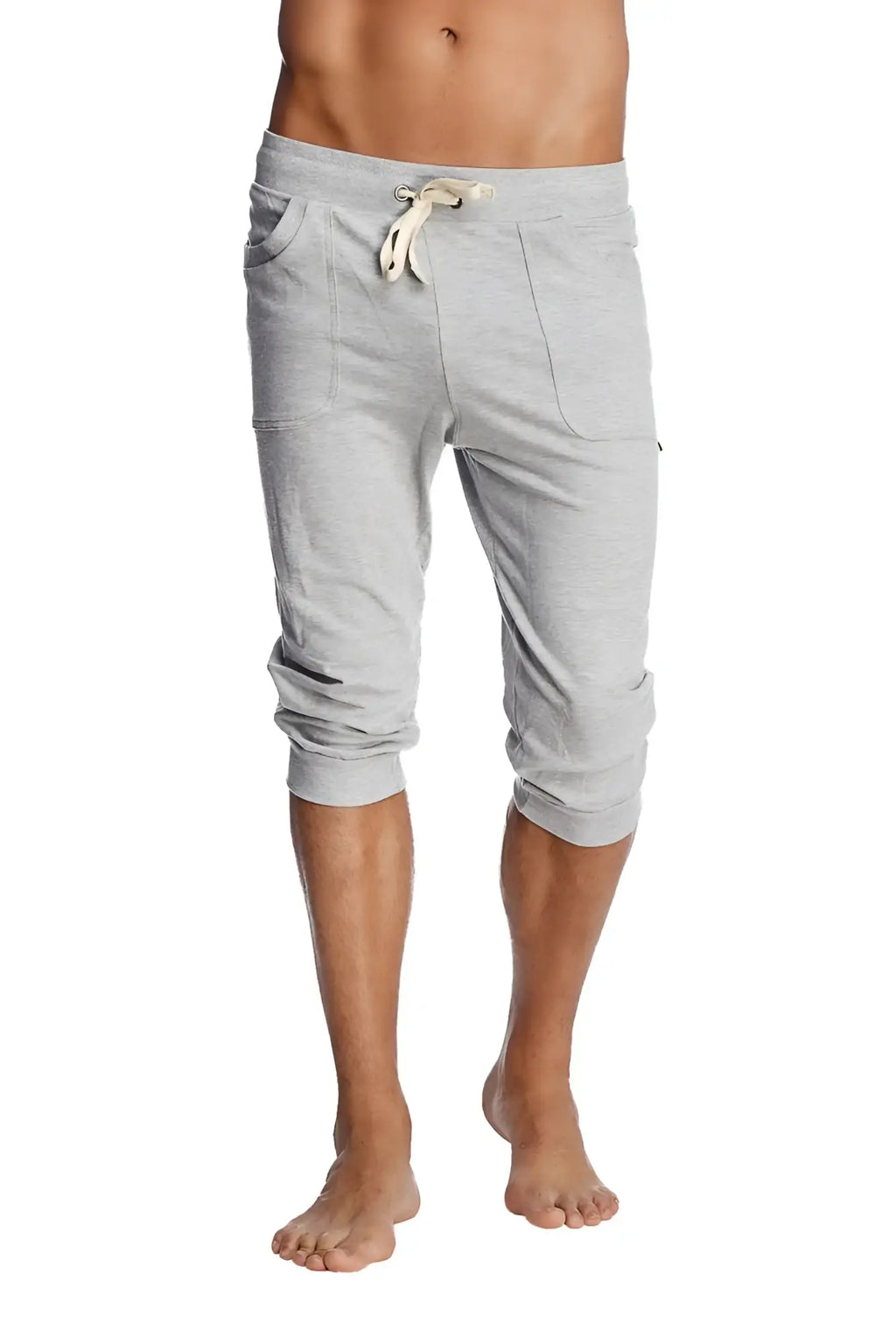 Gray heathered cuffed yoga pants with side pockets and drawstring waistband for comfortable activewear