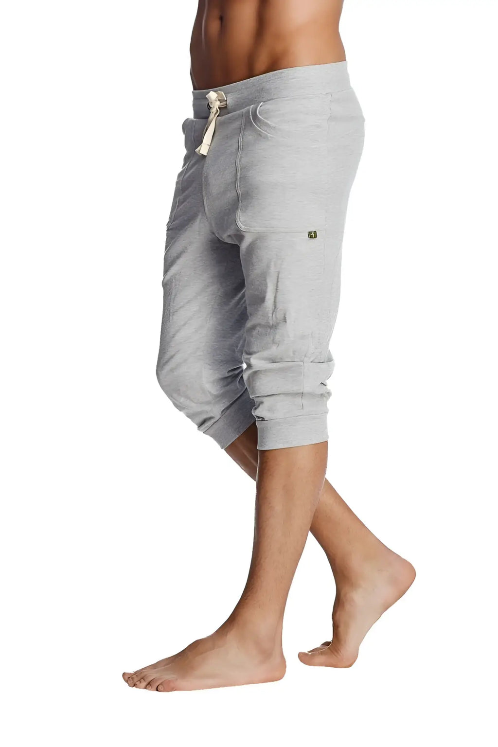 Gray heathered cotton cuffed yoga pants with a drawstring waistband and rolled cuffs for comfortable wear