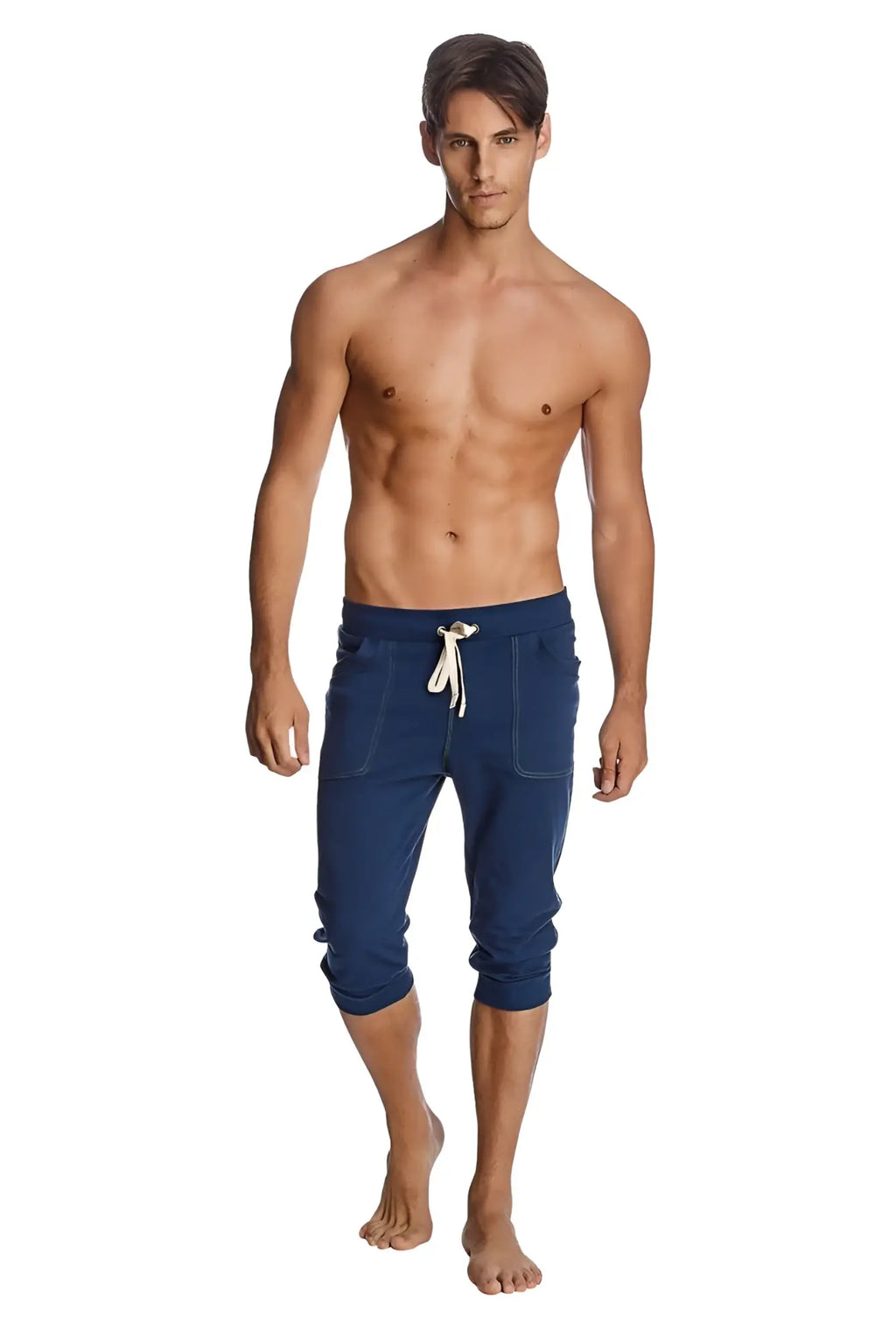 Navy blue cuffed yoga pants in capri length with white drawstring and side pockets for comfortable wear