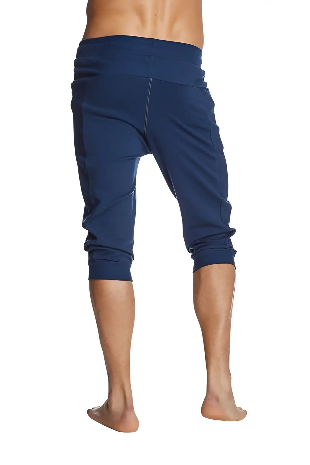 Navy blue stretchy cuffed yoga pants with elastic waistband and rolled cuffs for comfortable activewear