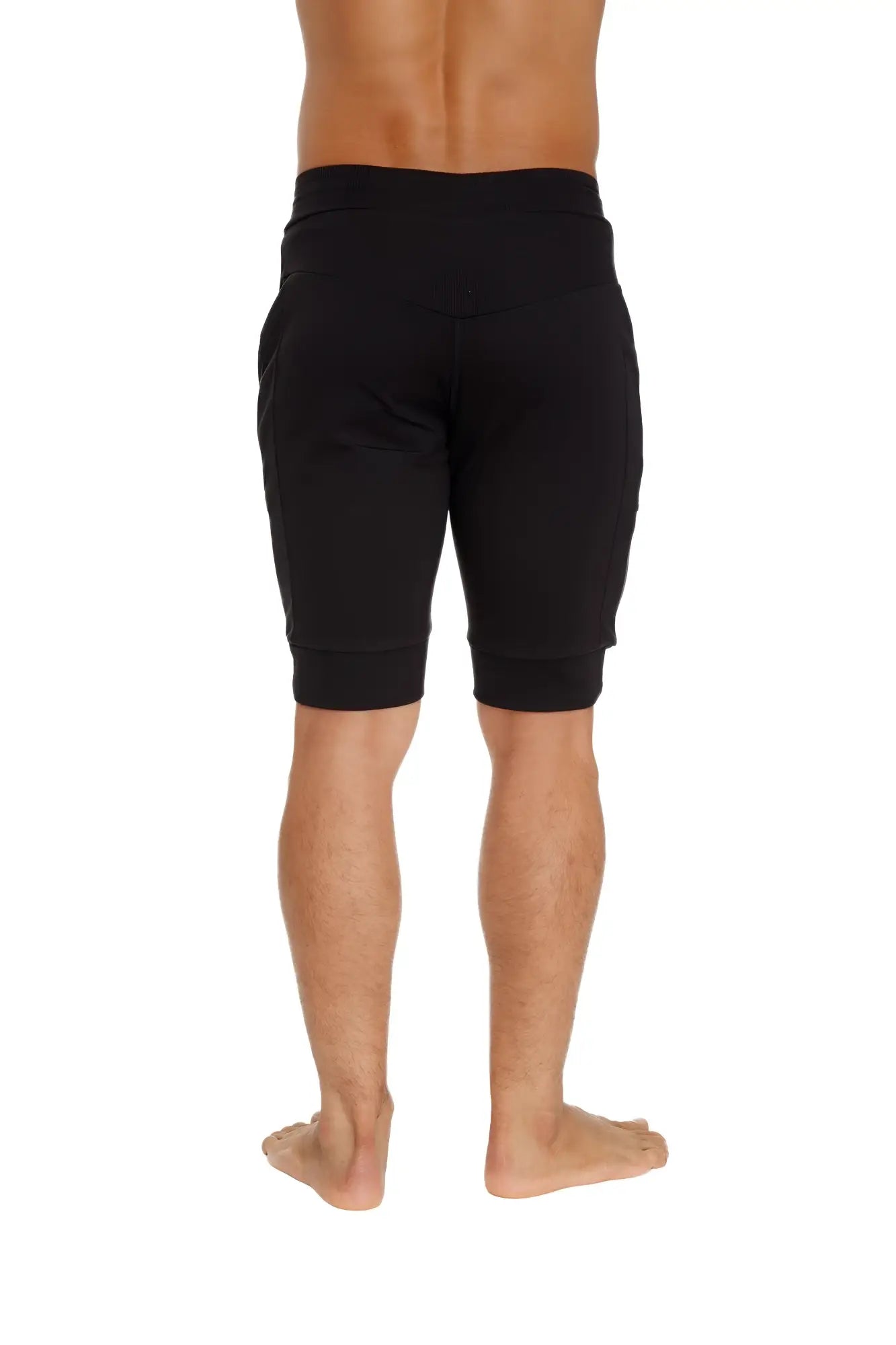 Black cuffed yoga shorts with comfortable elastic waistband and ribbed cuffs for athletic wear