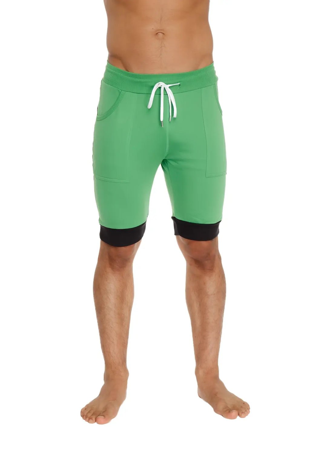 Cuffed yoga short in green with black trim and white drawstrings made for comfortable athletic wear