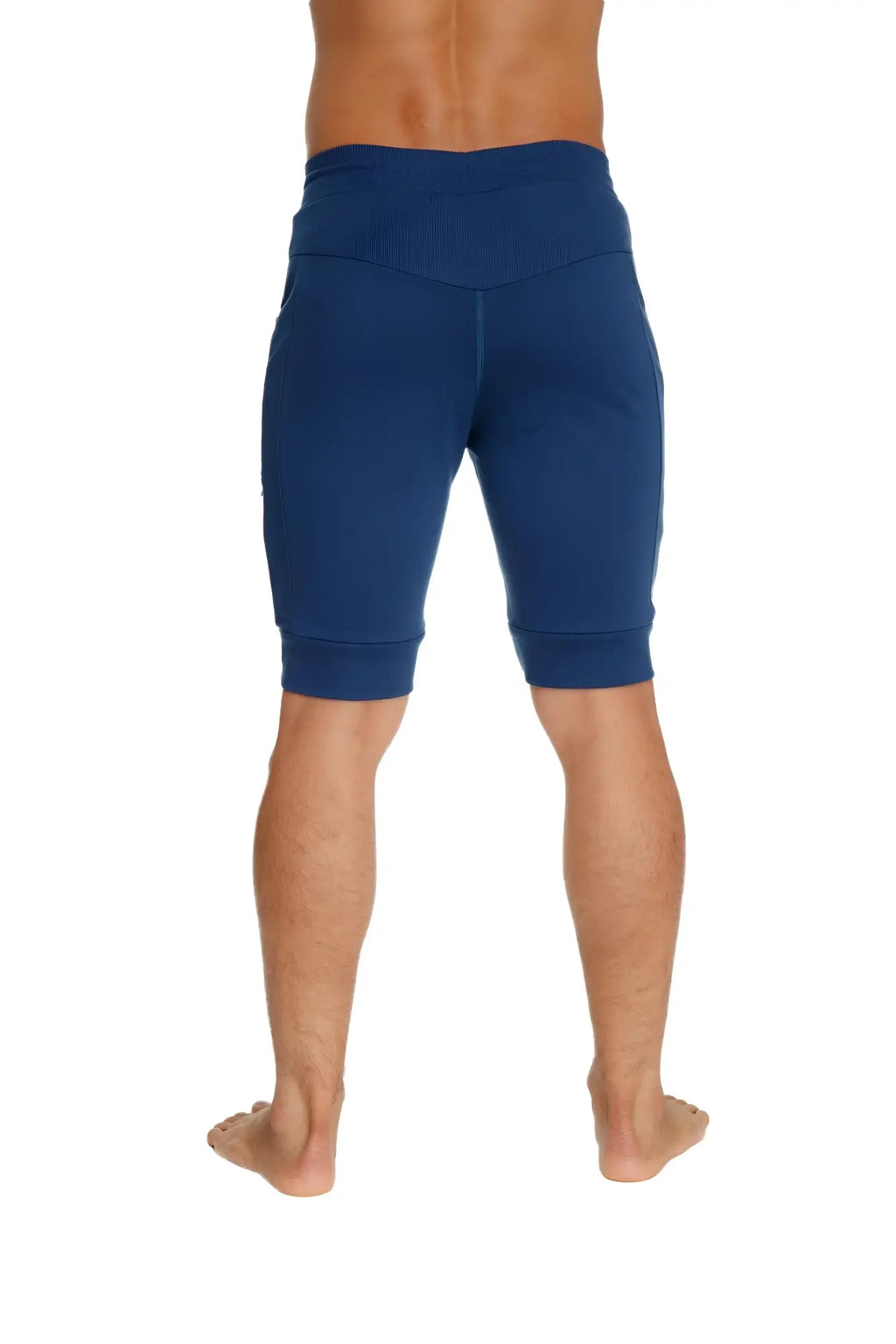 Deep blue high-waisted cuffed yoga shorts with snug fit and elastic cuffs for athletic wear