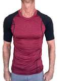 Designer raglan crew-neck tee in brick with black sleeves featuring subtle textured fabric for athletic wear