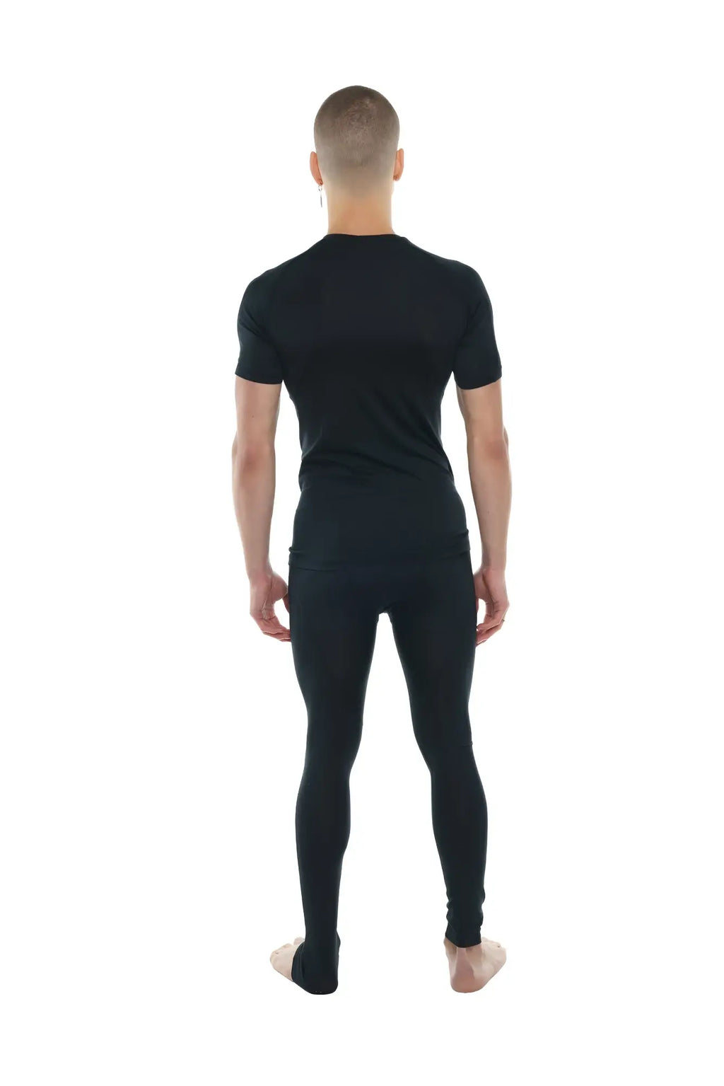 Black short-sleeved compression raglan crew-neck tee and matching leggings set in carbon black for activewear