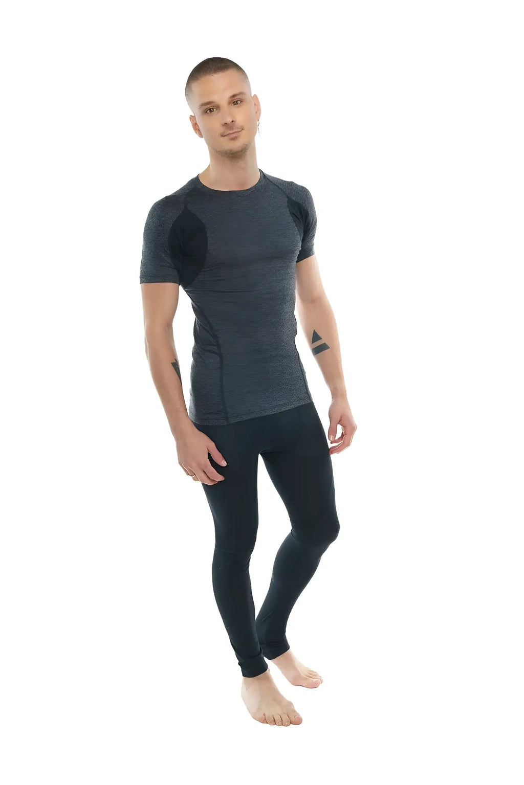 Dark gray and black designer raglan crew-neck tee with textured fabric panels paired with matching leggings