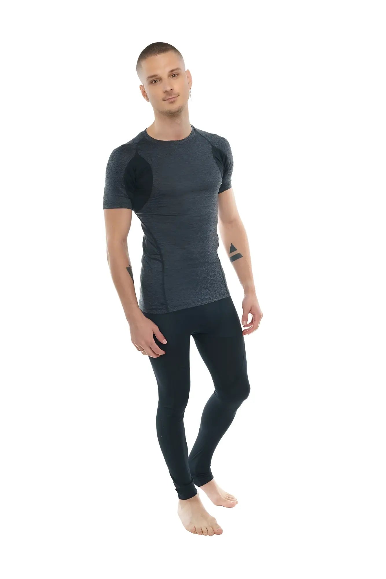 Dark gray and black designer raglan crew-neck tee with textured fabric panels paired with matching leggings