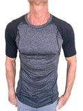 A men’s athletic short-sleeve designer raglan crew-neck tee with heathered charcoal torso and black sleeves