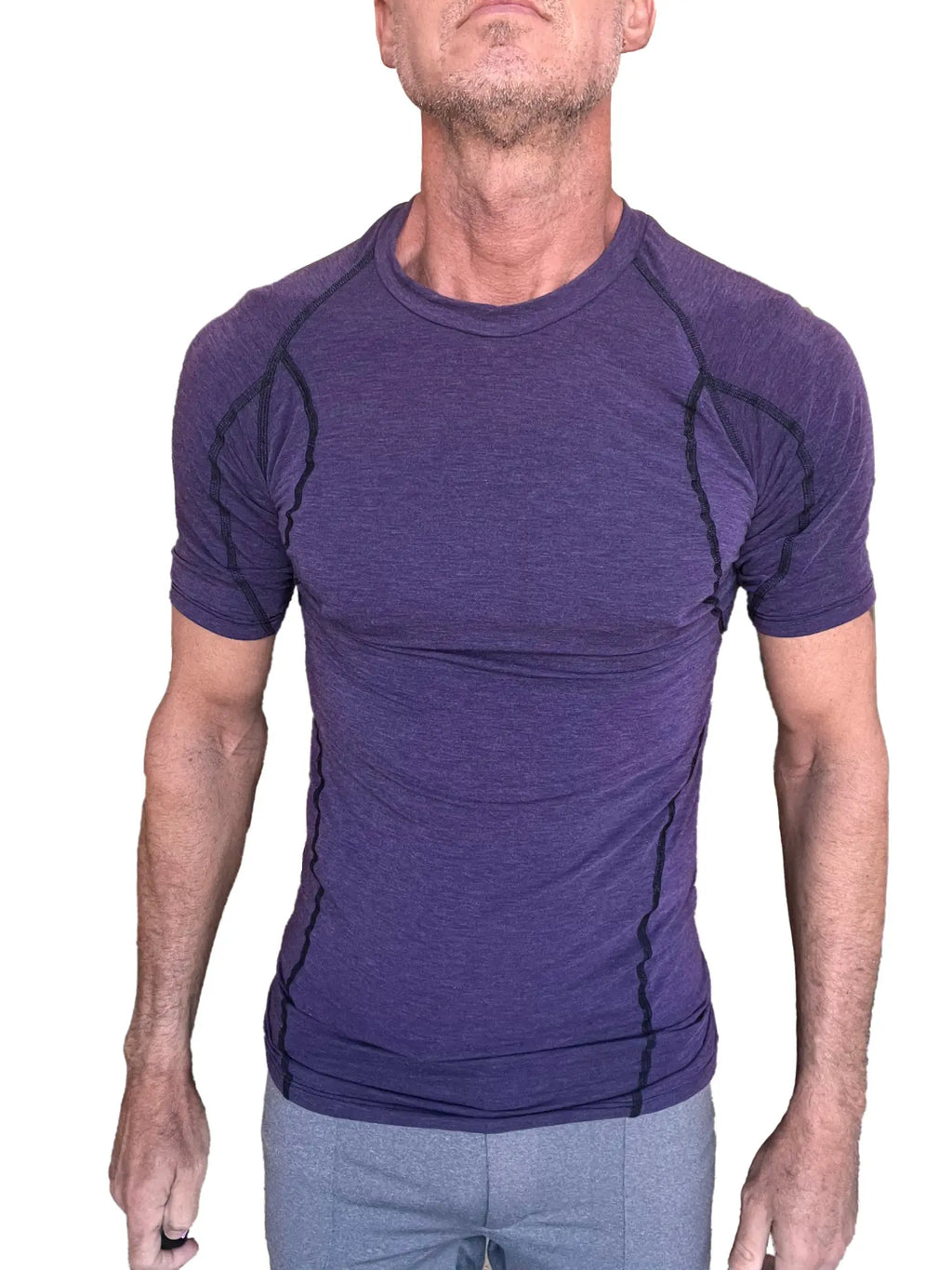 Designer raglan crew neck tee in eggplant purple with black seam detailing made of compression fabric for active wear