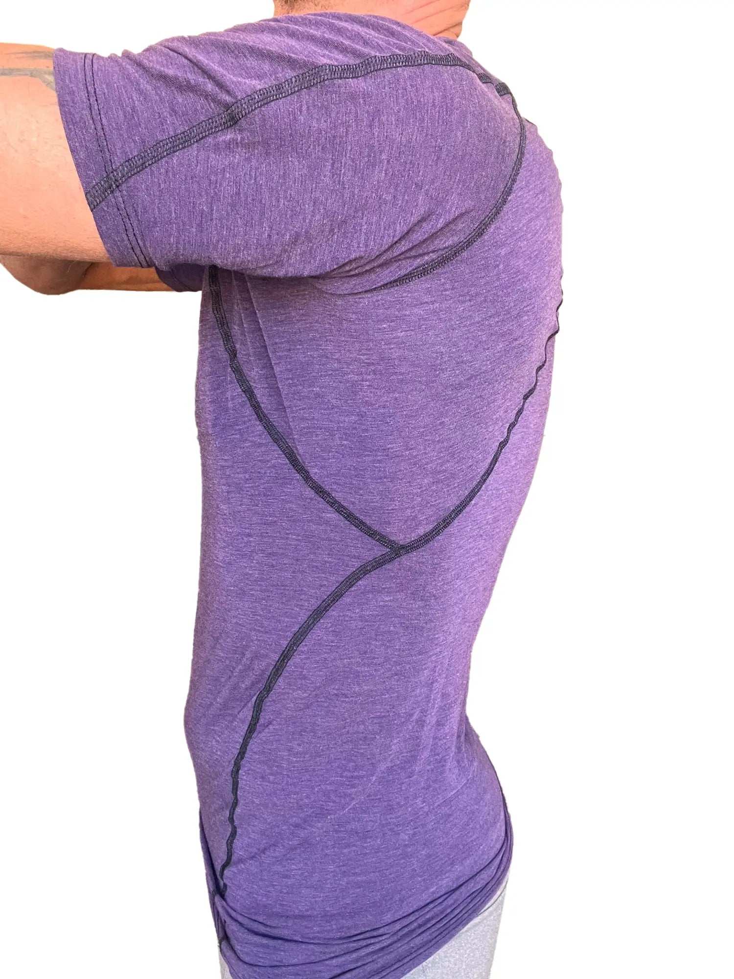 Designer raglan crew-neck tee in eggplant purple with purple heathered fabric and black contrast stitching along seams