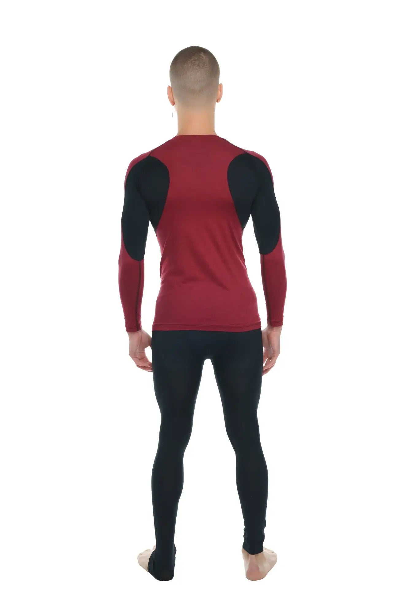 Red and black designer raglan crew neck long sleeve athletic top with contrasting shoulder panels in brick with black accent
