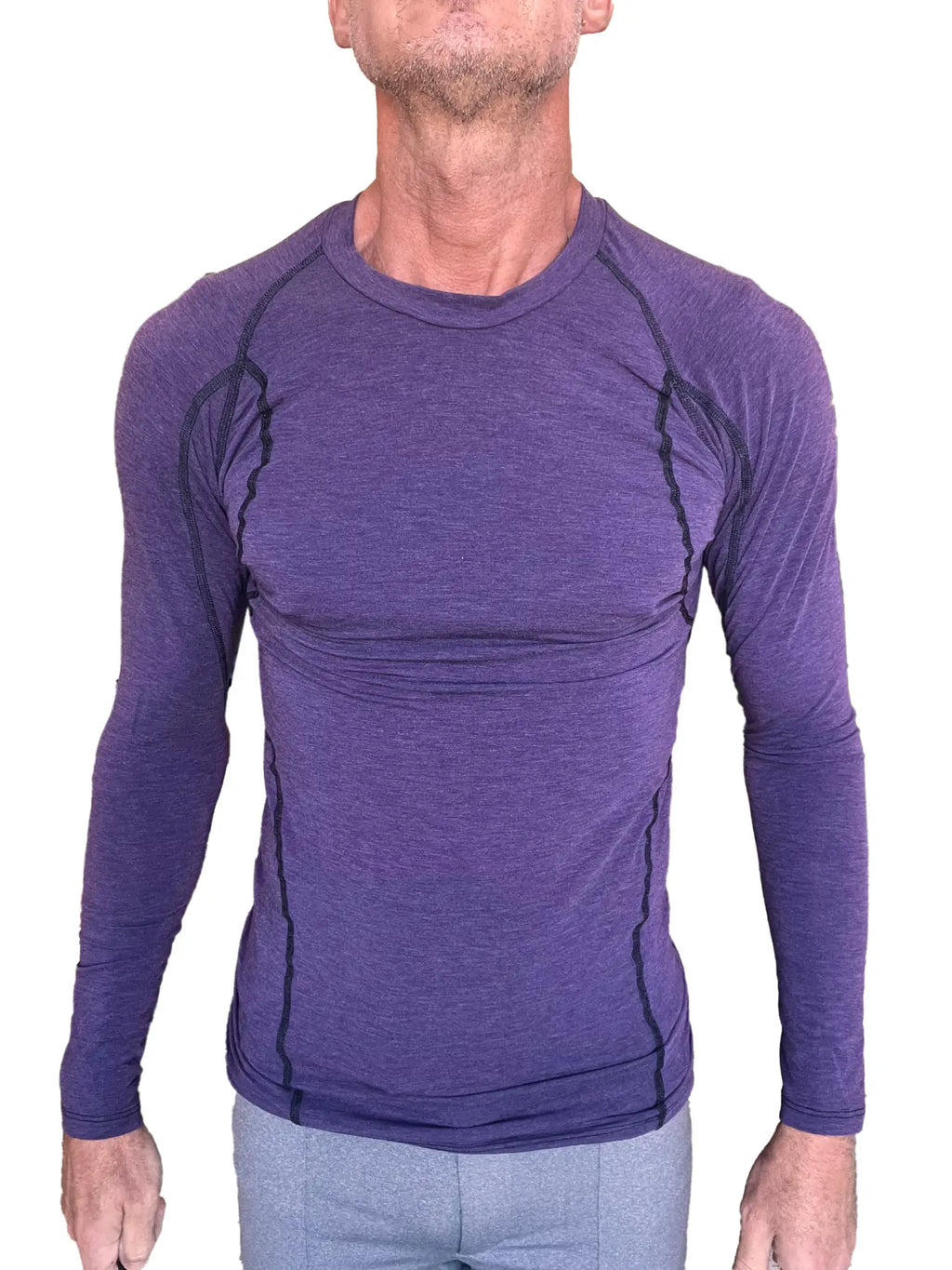 Purple long-sleeved designer raglan crew-neck tee with black seam detailing for athletic wear