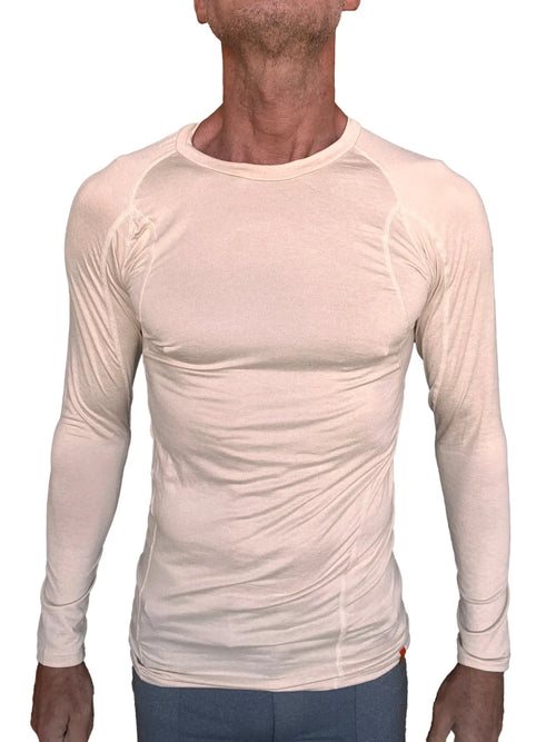 Beige long-sleeved designer raglan crew-neck performance shirt with subtle seam detailing in sand beige color