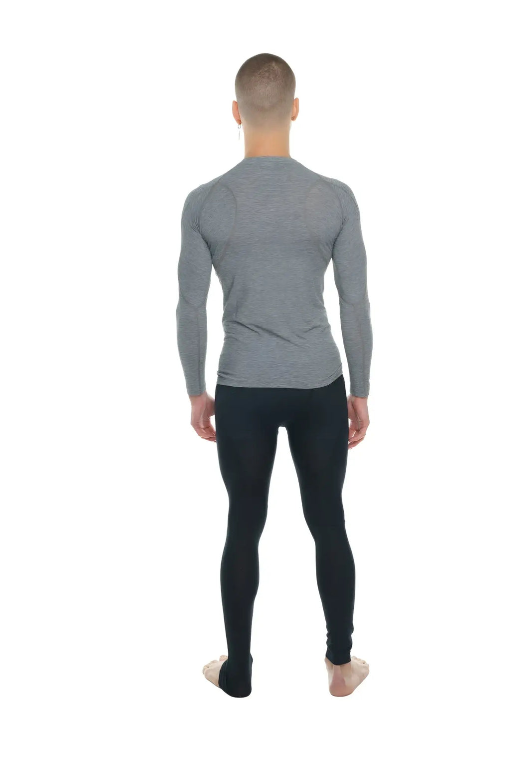 Gray long-sleeved designer raglan crew-neck tee with subtle horizontal ribbing and a snug, form-fitting design