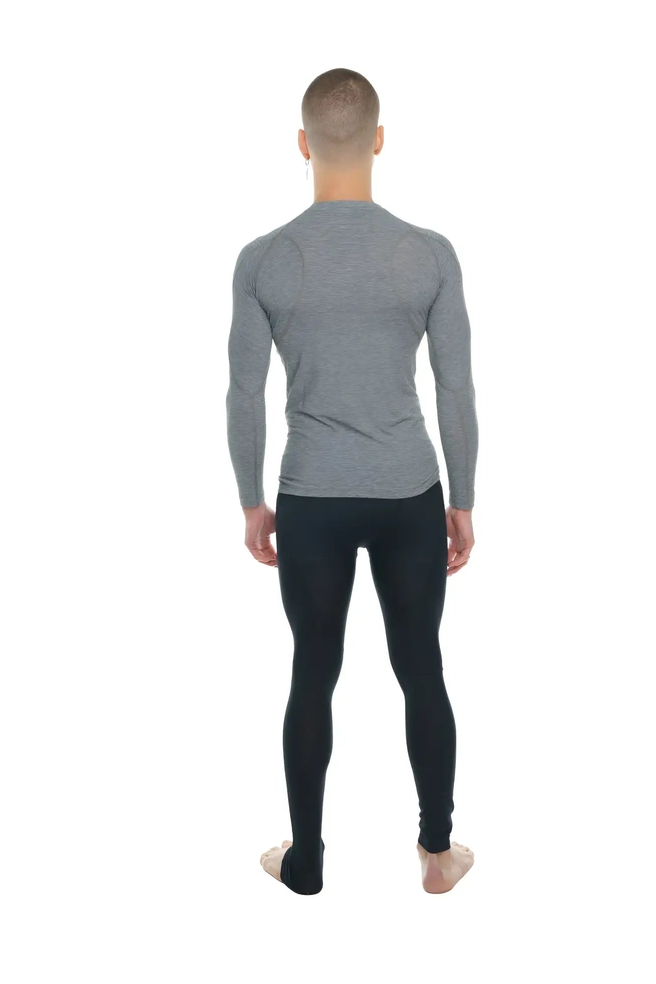 Gray long-sleeved designer raglan crew-neck tee with subtle horizontal ribbing and a snug, form-fitting design