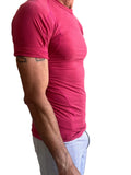 A fitted short-sleeved pink athletic tee with crew neck and subtle seam detailing designer raglan crew-neck tee raspberry