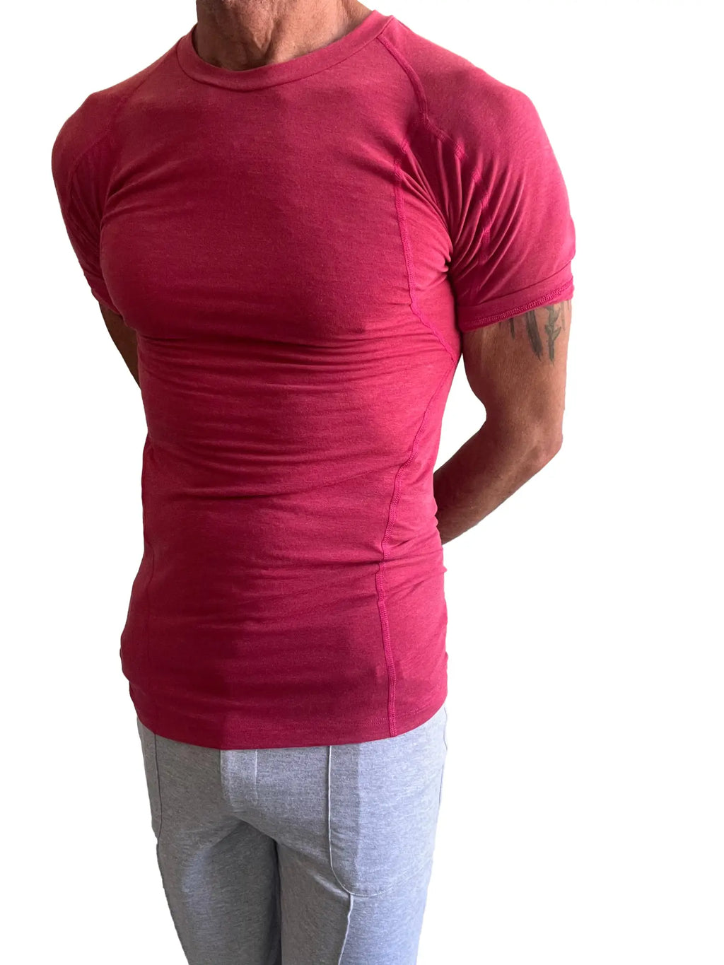 Designer raglan crew-neck tee raspberry in vibrant red with form-fitting fit and short raglan sleeves for athletic use
