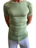 A fitted olive green short-sleeved athletic tee with raglan sleeves and crew neckline for active wear