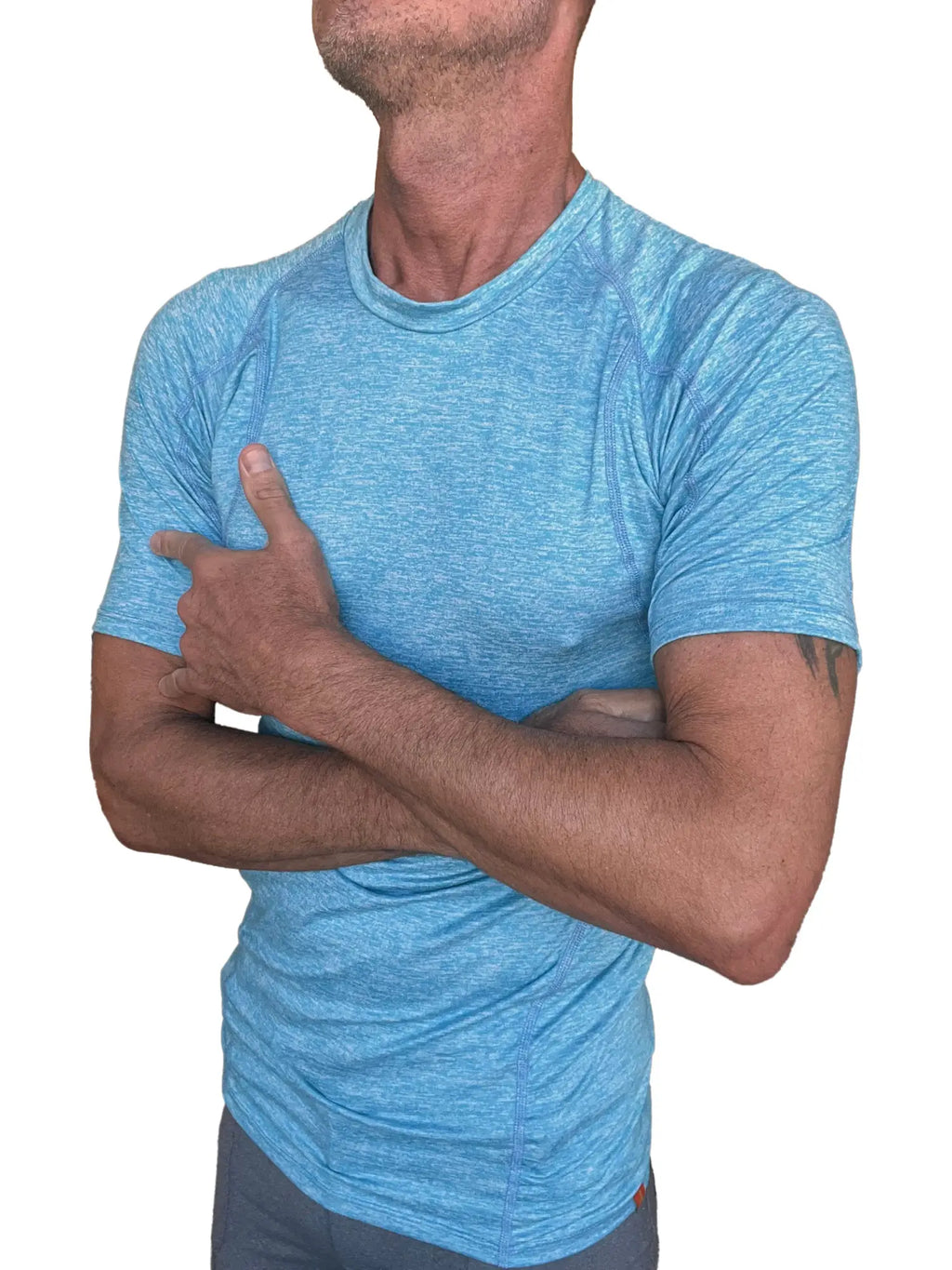 A light blue heathered designer raglan crew neck tee with short sleeves made for athletic wear