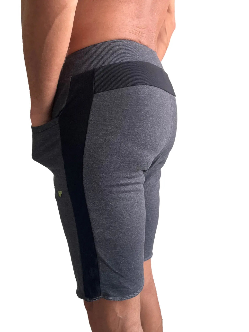 Eco-track short charcoal with black athletic shorts with ribbed waistband side panels and green logo on thigh