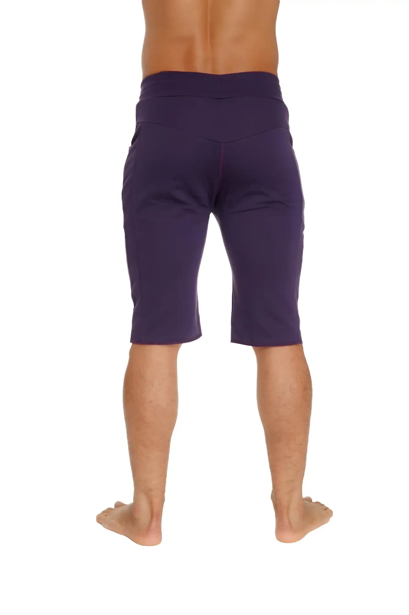 Eco-track short in eggplant purple with comfortable elastic waistband and side pockets for athletic use