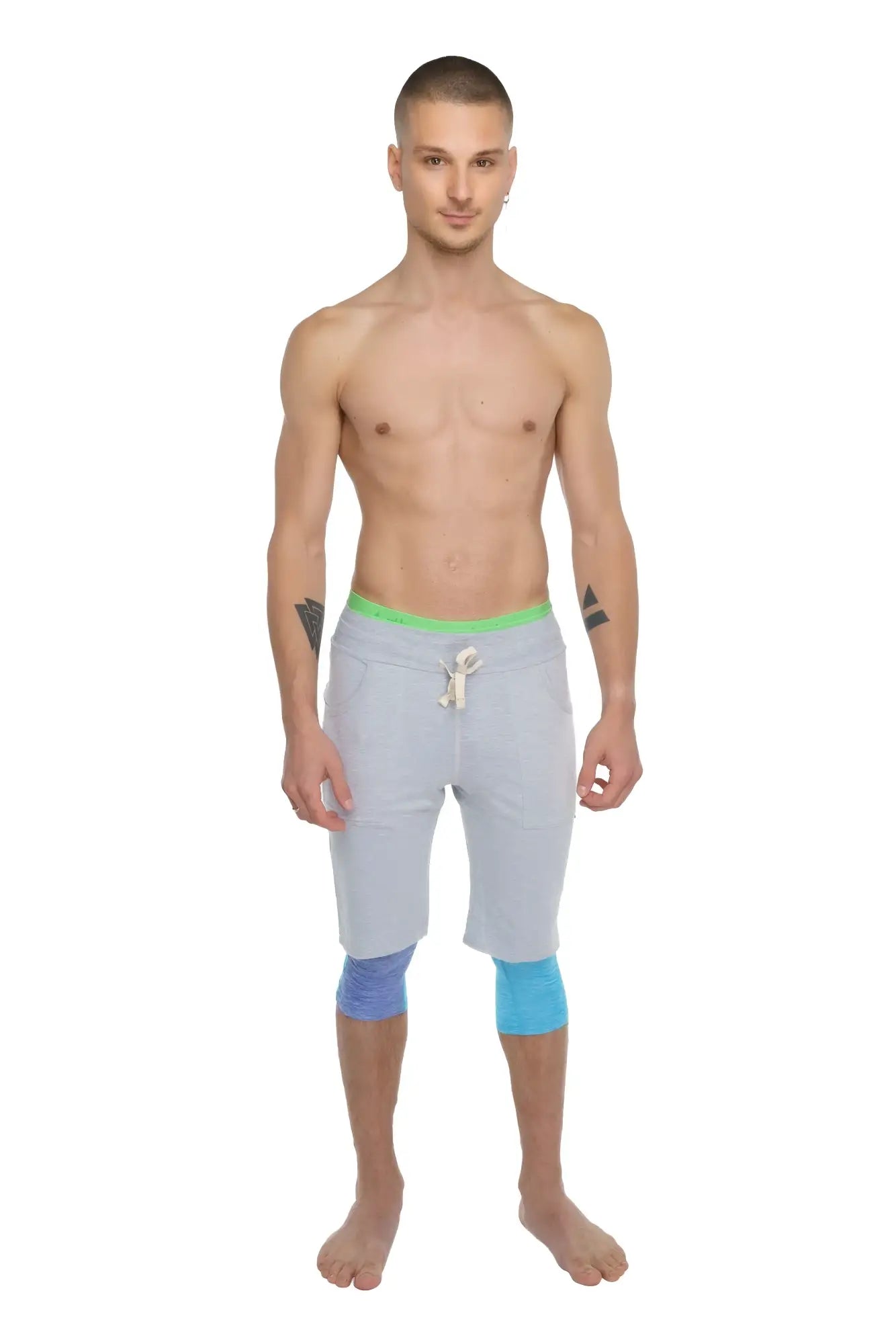 Light gray eco-track shorts with neon green waistband and blue knee patches for athletic use in heather grey fabric