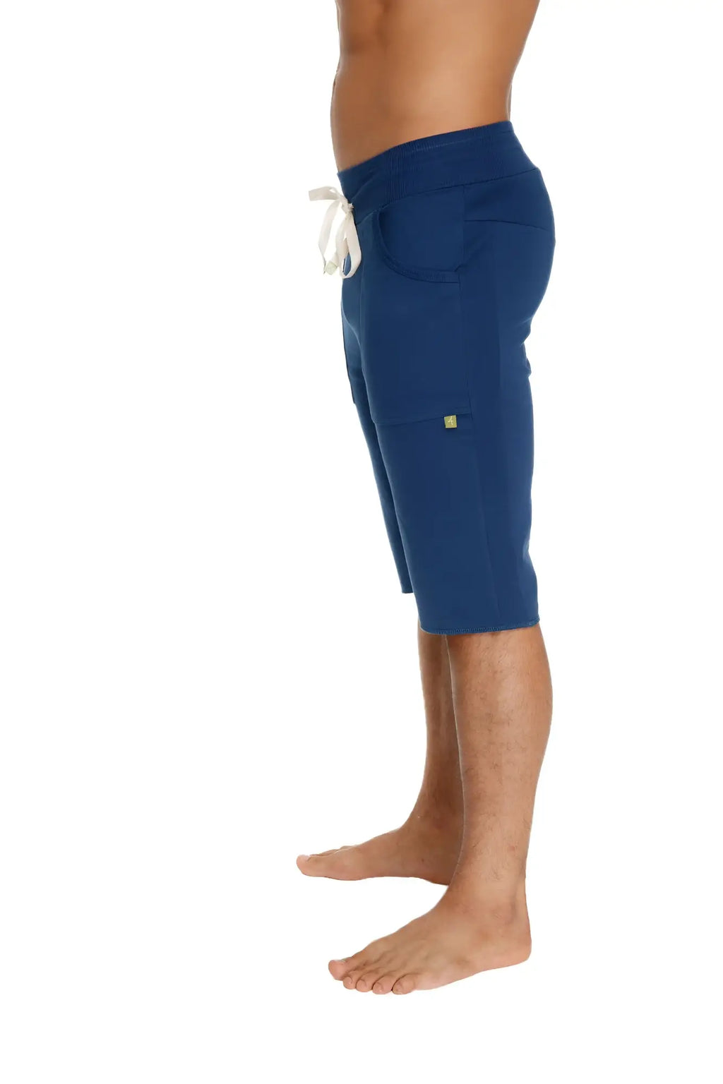 Navy blue eco-track cotton shorts with white drawstring and small green logo on side pocket for casual wear