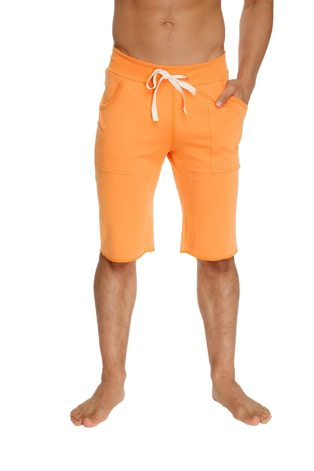 Bright orange eco track cotton shorts with white drawstrings and side pockets for casual activewear use